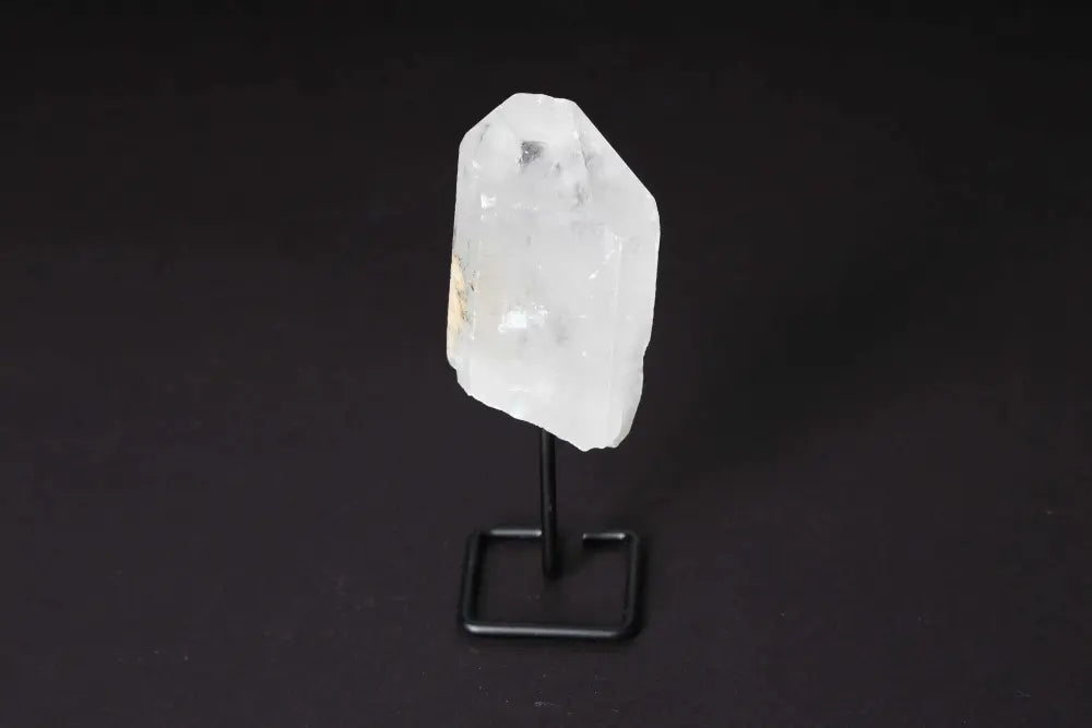Natural Clear Quartz Point with Stand for energy amplification and focus, ideal for meditation and manifestation practices.