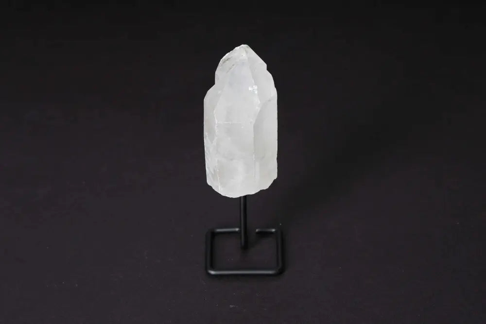 Natural Clear Quartz Point on Stand for energy amplification and clarity, perfect for meditation and home decor elegance.