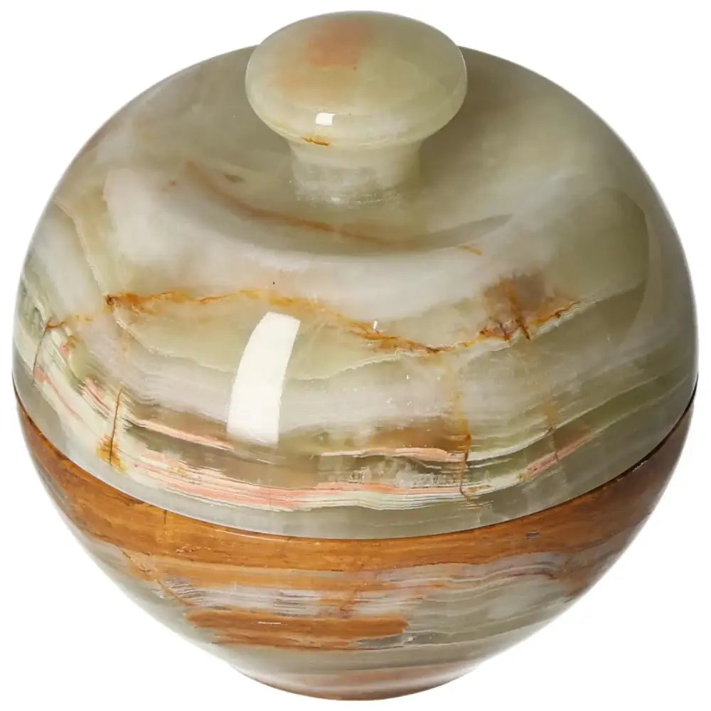 Onyx 10cm bowl with lid featuring unique veining and polished surface, enhancing elegance and sophistication in home décor.