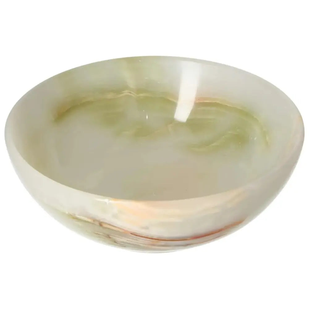 Polished onyx bowl 15 cm with delicate veining and a smooth surface, showcasing unique organic color variations and natural artistry.