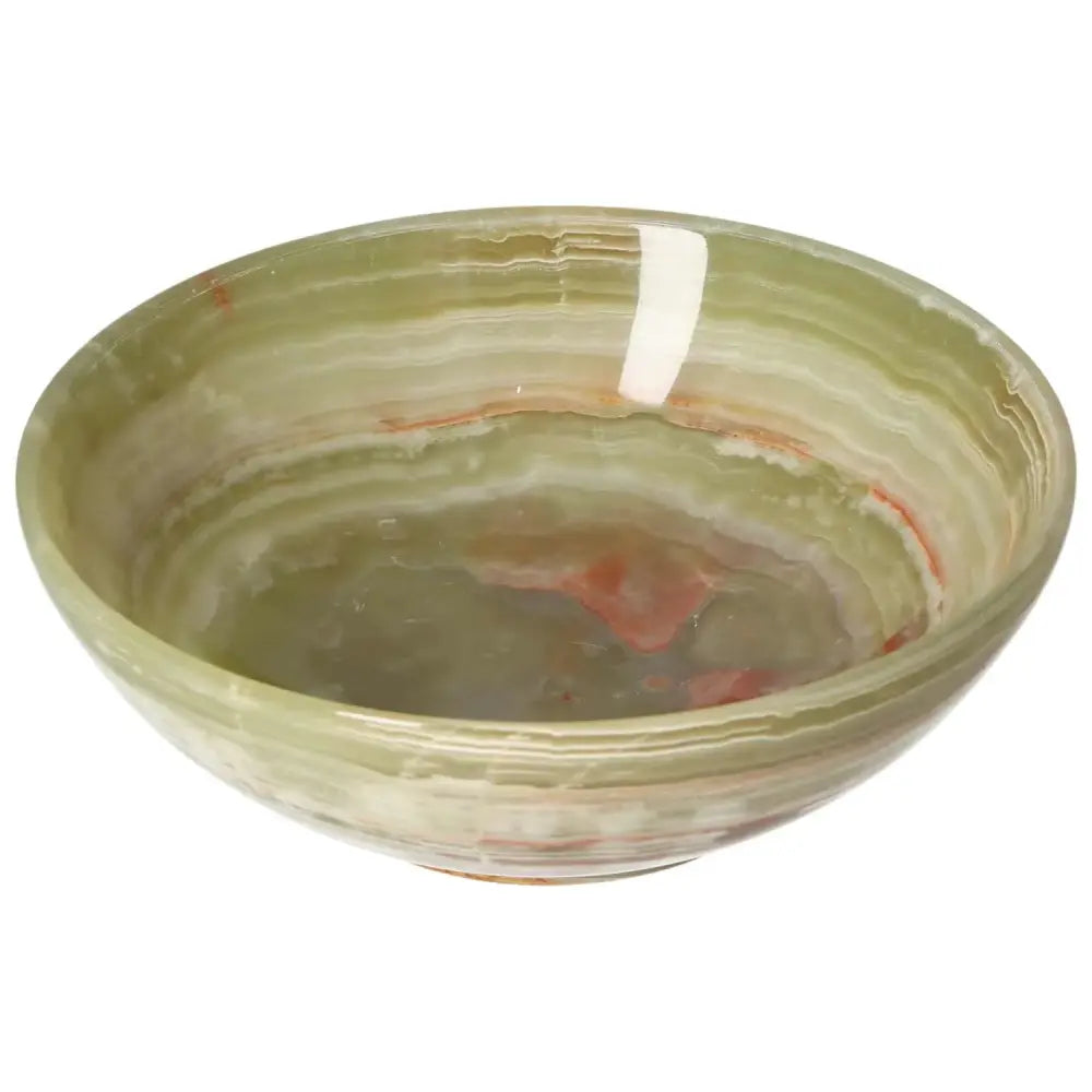 Elegant 15 cm onyx bowl with smooth surface and natural veining, perfect for enhancing home décor with its timeless elegance.