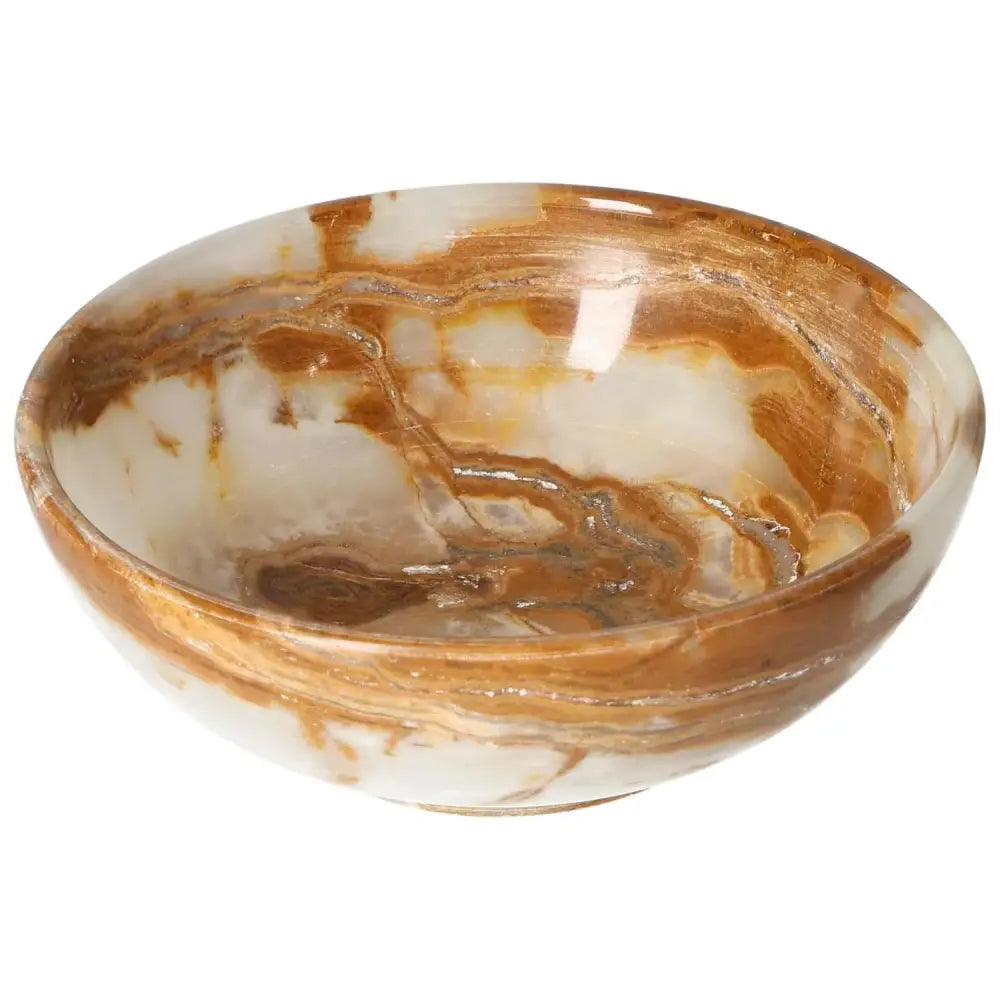 Onyx bowl 15 cm with elegant veining and smooth polished surface, reflecting light beautifully, ideal for sophisticated décor.