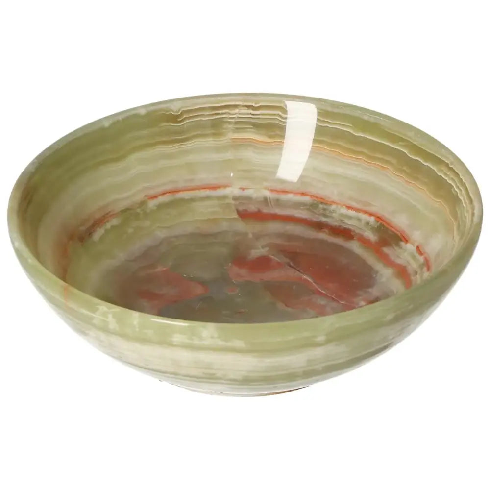 15 cm onyx bowl with unique veining and soft translucent colors, perfect for adding elegant decor and sophistication to any space.