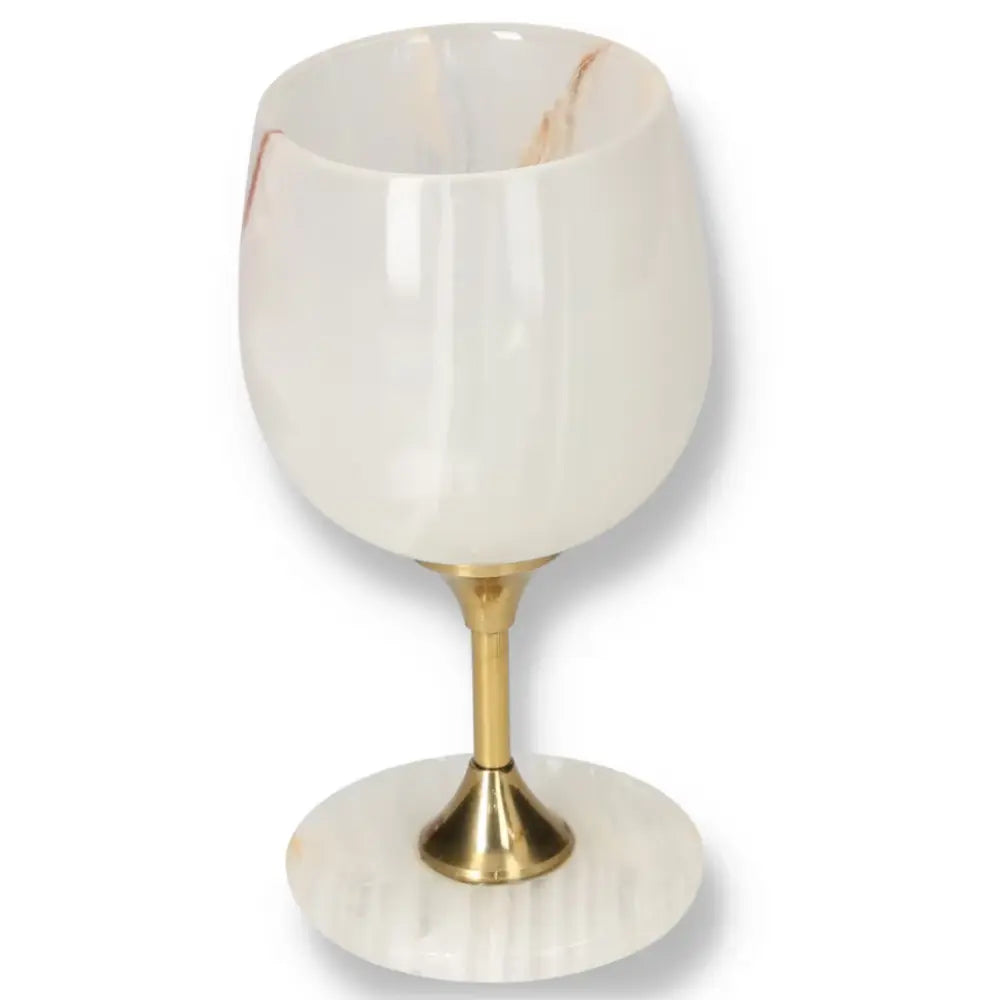 Exquisite off-white onyx wine glass with elegant veining and a polished surface, showcasing unique craftsmanship and sophisticated design.