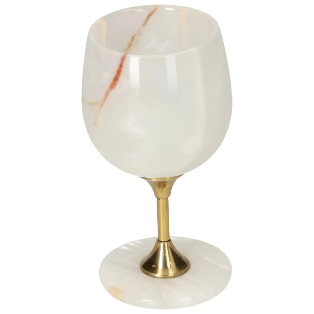 Premium off-white onyx wine glass with unique veining, featuring a polished surface and elegant design for sophisticated occasions.