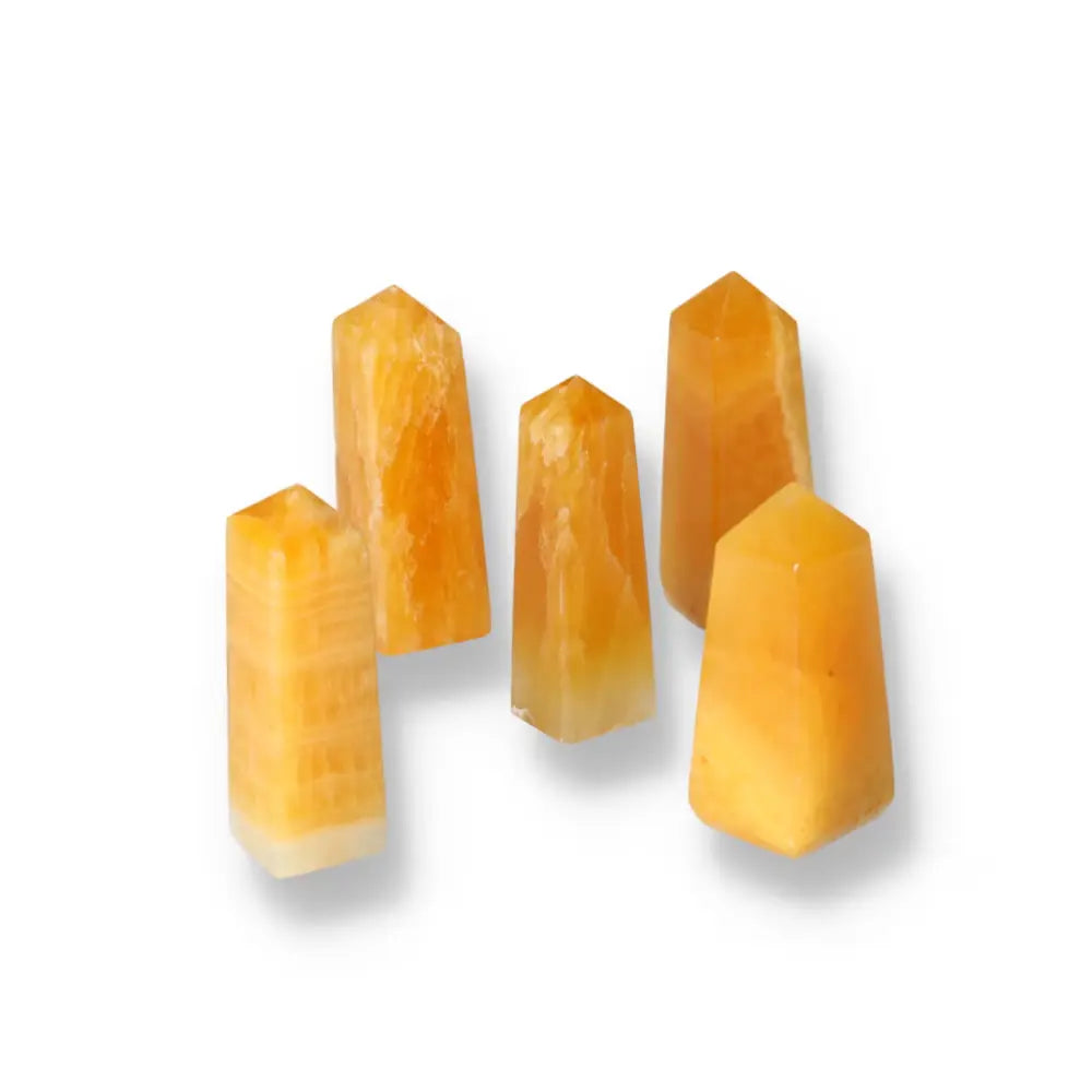 Orange Calcite Towers for energy healing and creativity, polished crystal points ideal for meditation and manifestation.