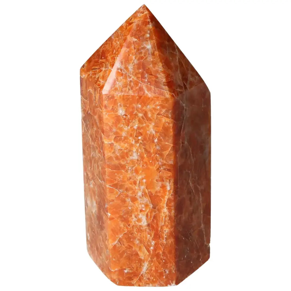 Orchid Calcite Obelisk from Sylvia Crystals with warm orange and peach hues, showcasing premium quality and aesthetic appeal.