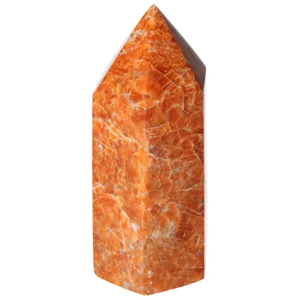 Orchid Calcite Obelisk showcasing orange and peach hues, polished finish by Sylvia Crystals, perfect for enhancing home decor.