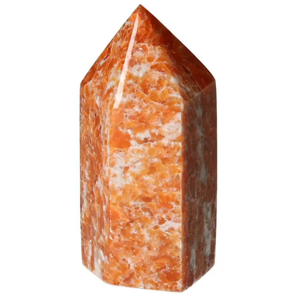 Orchid Calcite Obelisk showcasing vibrant orange and peach hues, available from Sylvia Crystals as a premium decorative piece.