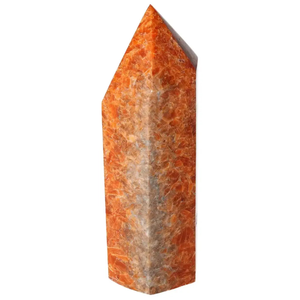 Orchid Calcite Obelisk with vibrant orange and peach hues, symbolizing clarity and spiritual growth, crafted by Sylvia Crystals.