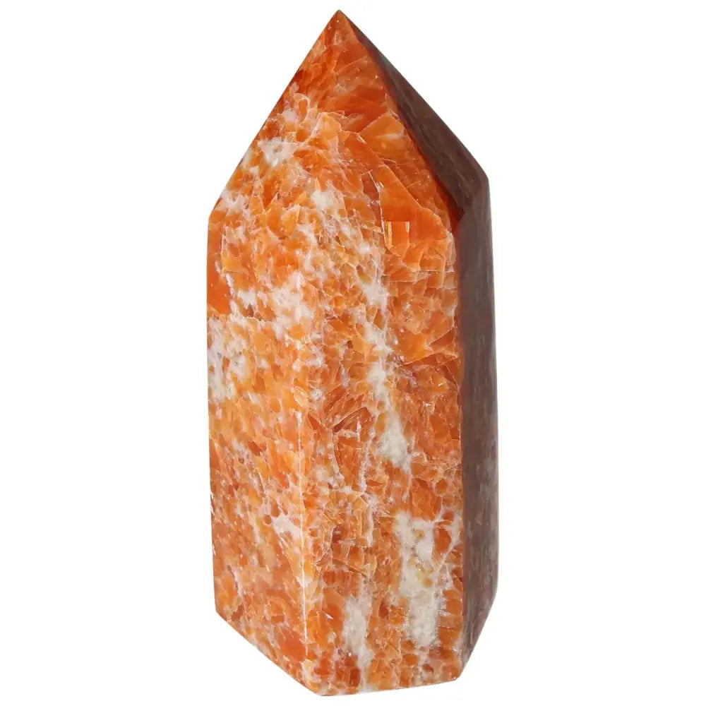 Orchid Calcite Obelisk featuring warm orange, peach, and creamy white hues, handcrafted by Sylvia Crystals for elegant decor.