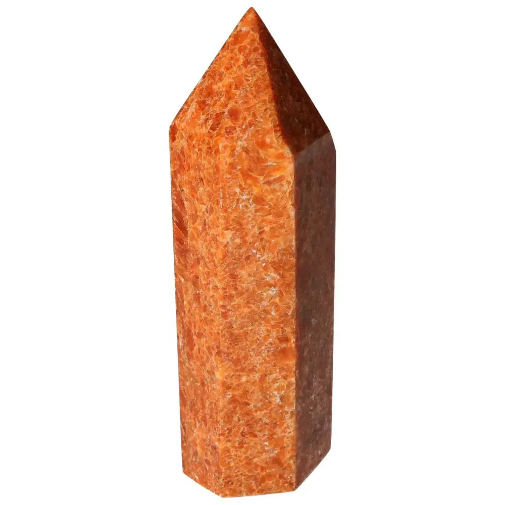 Orchid Calcite Obelisk from Sylvia Crystals, showcasing vibrant orange hues symbolizing clarity and spiritual growth.