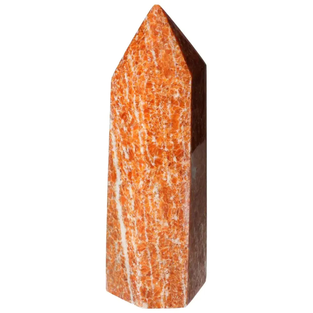 Orchid Calcite Obelisk featuring natural orange and white patterns, handpicked by Sylvia Crystals for luxury and spirituality.