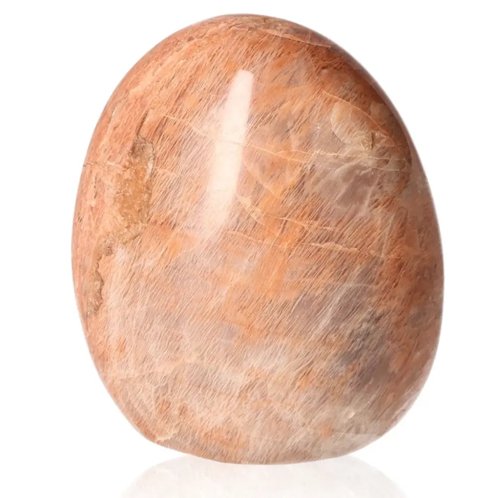 Peach Moonstone gemstone with soft peach hue for emotional healing and calmness.