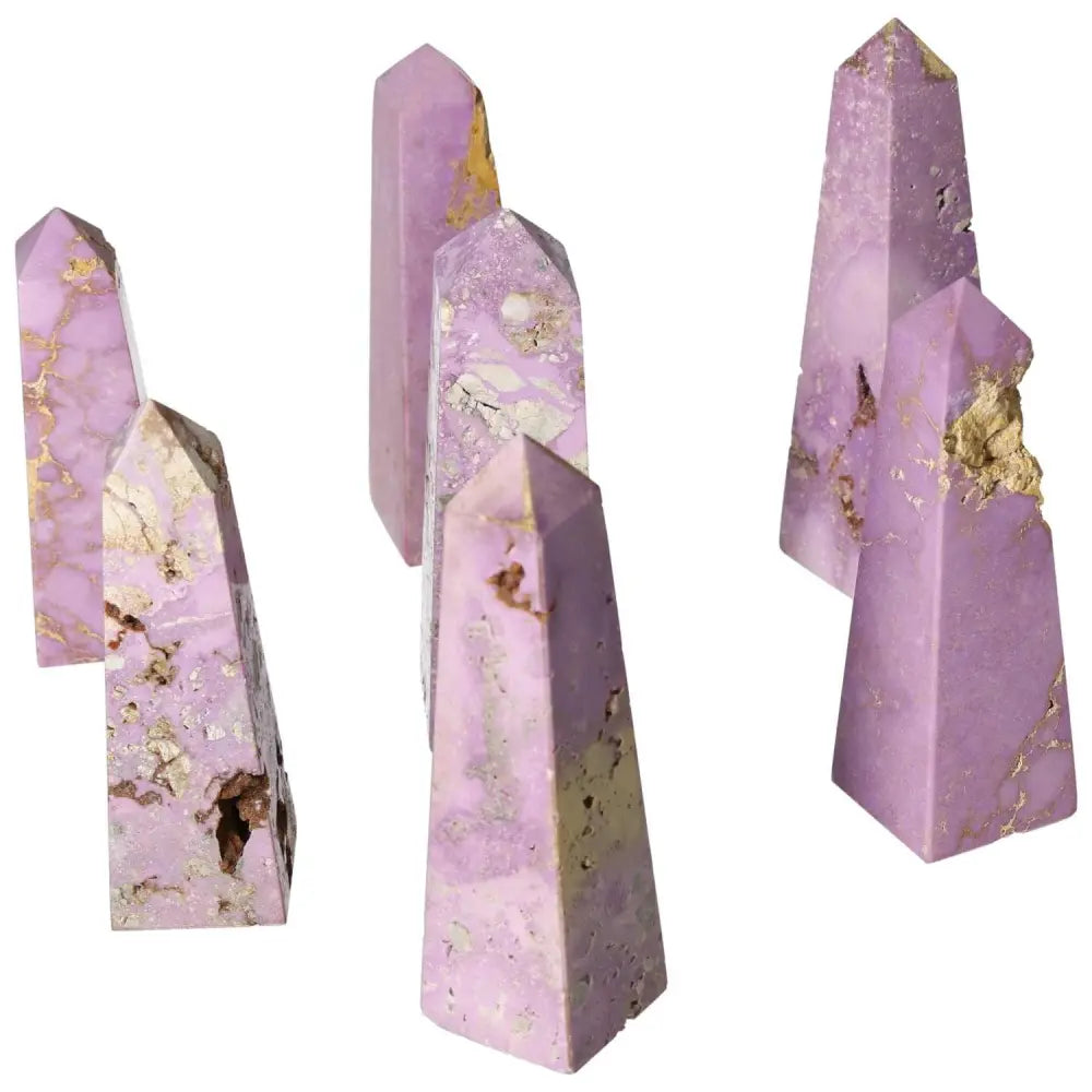 Collection of purple Phosphosidente Towers with unique patterns and natural textures, ideal for decor and crystal enthusiasts.