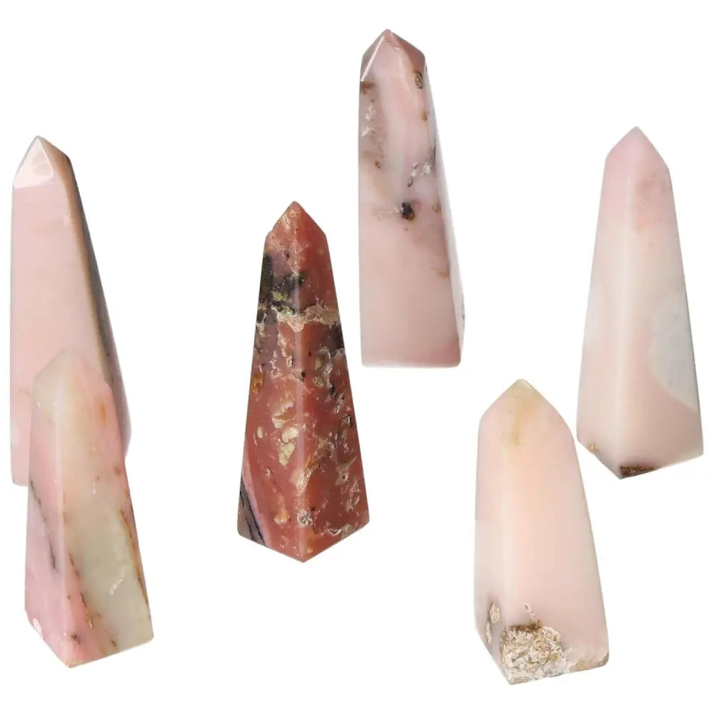 Pink Opal Towers in various soft, pastel pink shades promoting emotional healing and calming energy, displayed on a white background.