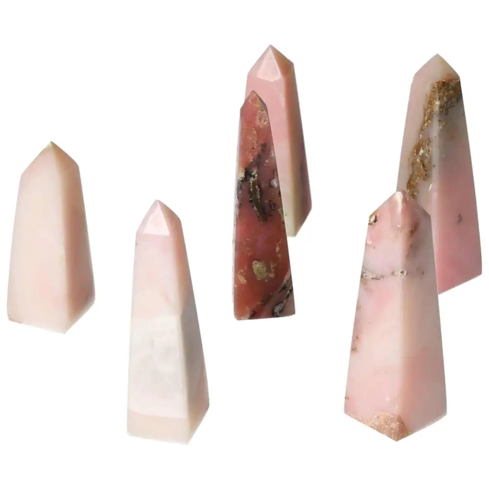 Pink Opal Tower gemstones display soothing pastel shades and opalescent sheen, known for promoting emotional healing and personal transformation.