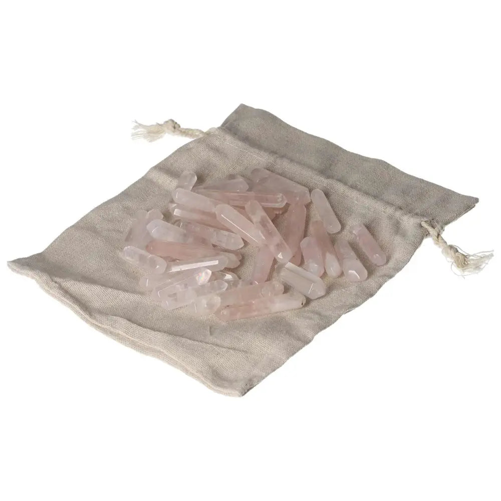 Bag of small pink quartz sticks for crystals and healing