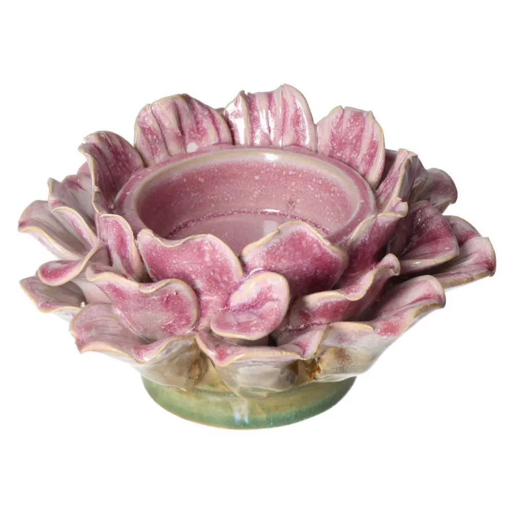 Pink stoneware flower motif candle holder from Sylvia Crystals, blending luxury and mindfulness. Size: 16x16x19 cm.