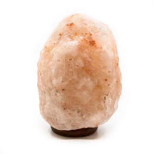 Himalayan Salt Lamp 4Kg emitting warm amber light, crafted from authentic pink salt crystals for home décor and wellness benefits.