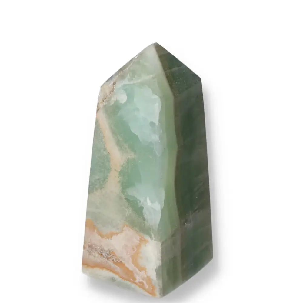 Pistachio Calcite Tower crystal with pale green hues, perfect for creating balance and harmony in any space