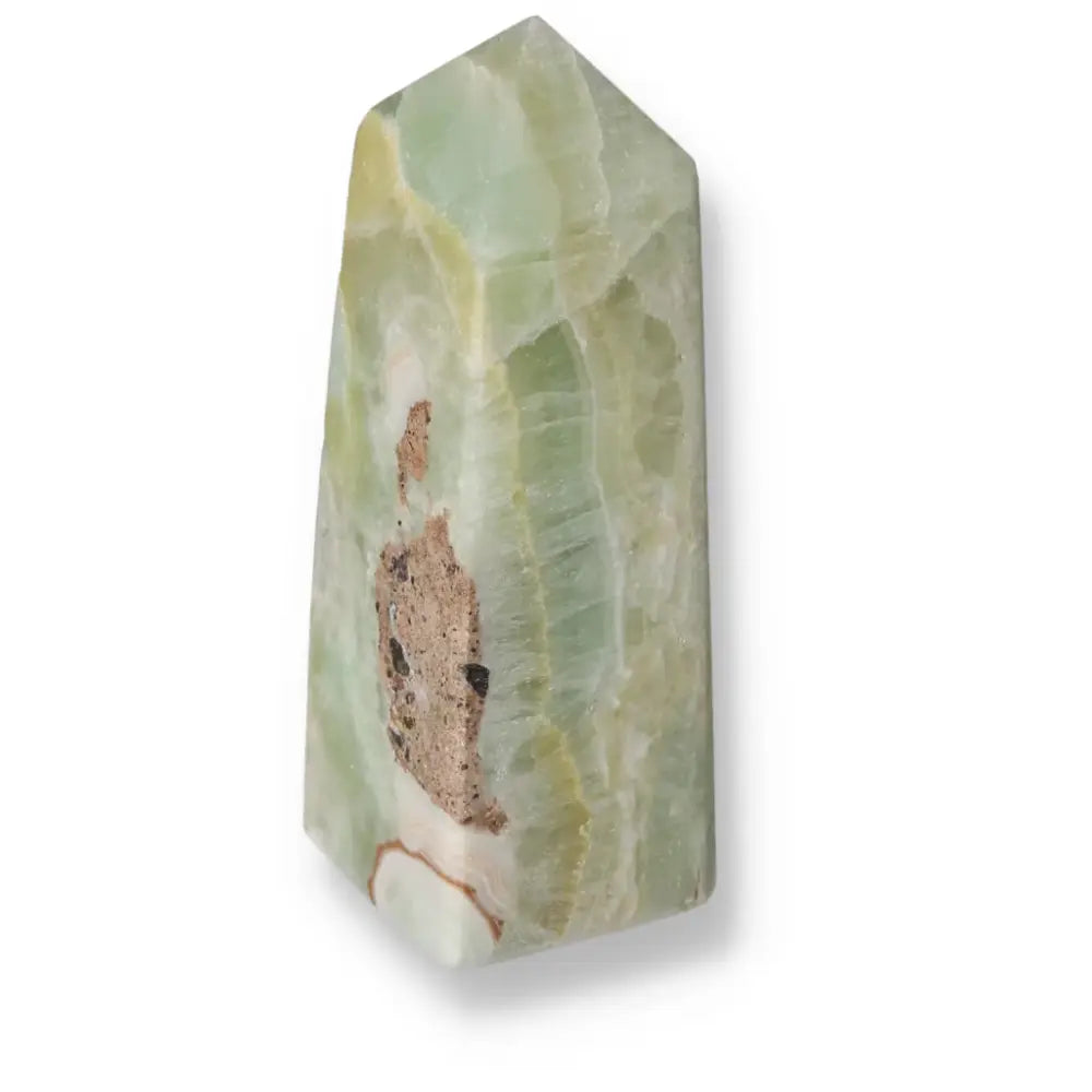 Pistachio Calcite Tower with pale green hues for calm and harmony, featuring natural artistry and soothing metaphysical properties.