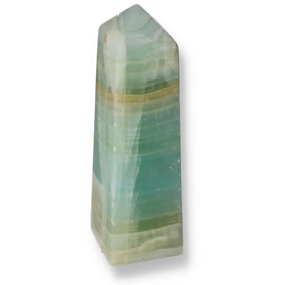 Pistachio Calcite Tower with soothing green hues, perfect for home decor and creating a sense of calm and harmony.
