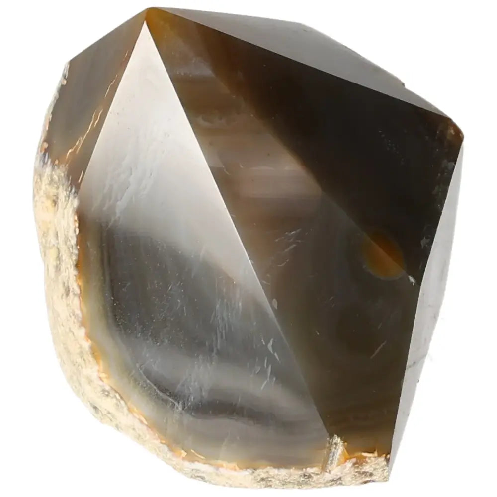Polished agate crystal point from Sylvia Crystals, enhancing spiritual balance.