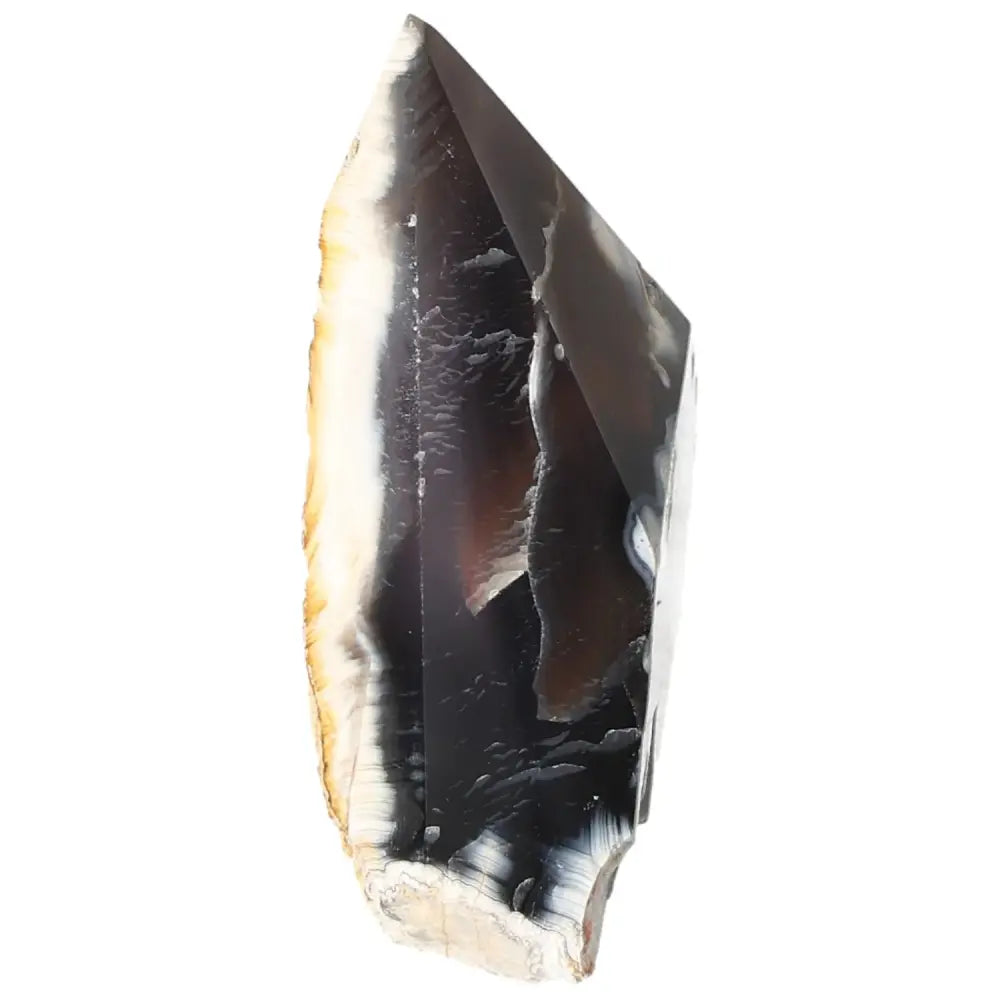 Sublime polished agate point with black and white hues, showcasing premium craftsmanship from Sylvia Crystals.
