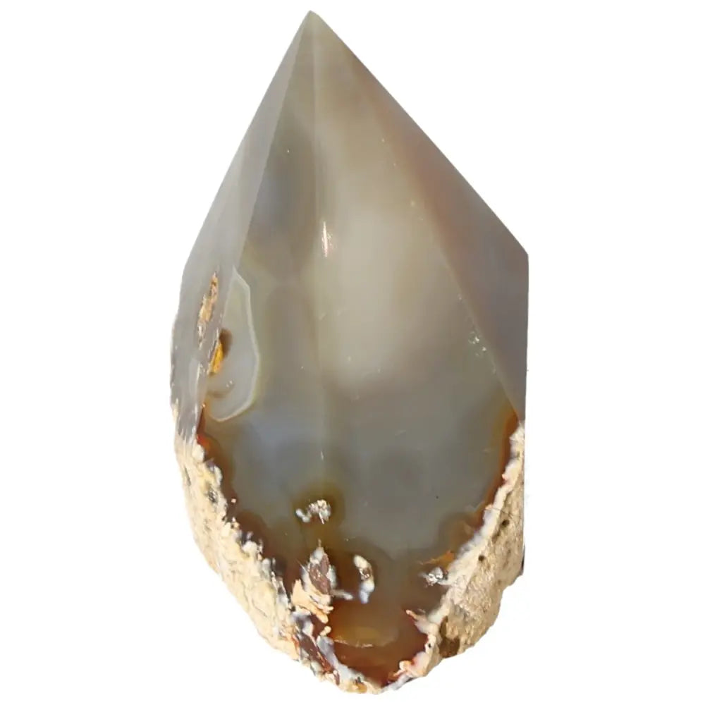 Polished Agate Point crystal with natural hues, a premium gemstone from Sylvia Crystals for spiritual growth and energy harmonization.