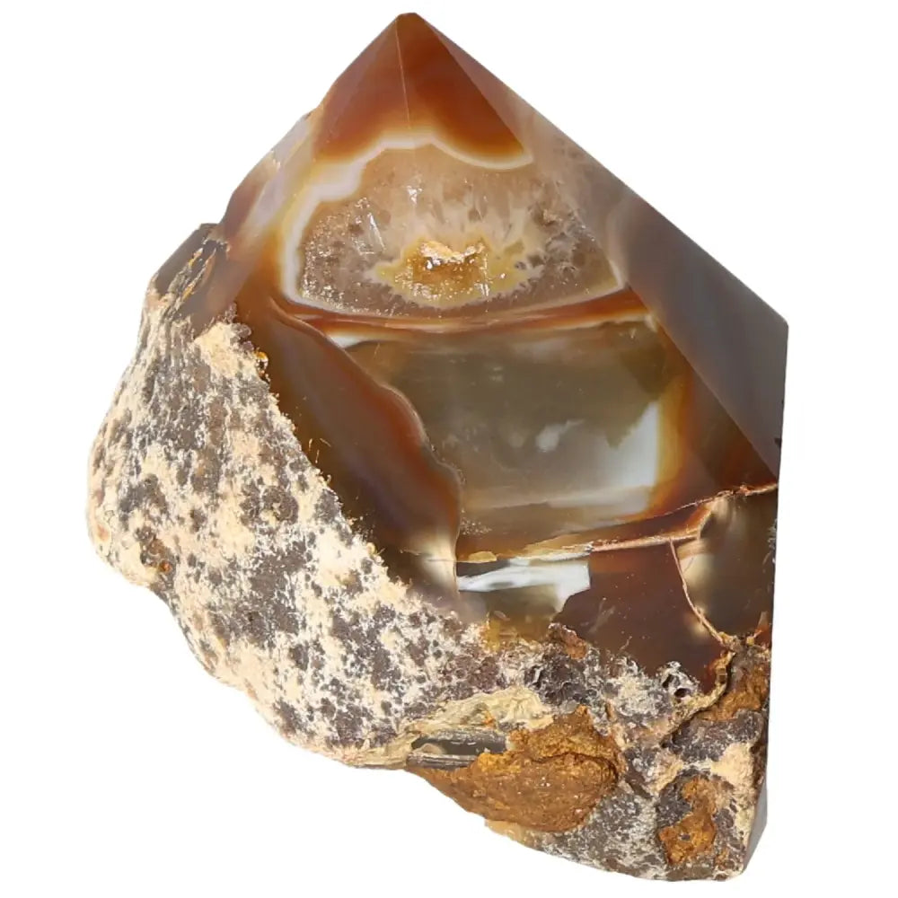 Polished agate point with vibrant natural patterns and colors from Sylvia Crystals.