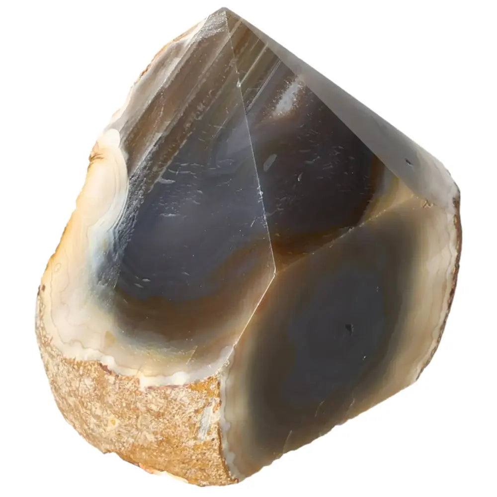 Polished Agate Point gemstone from Sylvia Crystals, showcasing its unique patterns and grounding properties for energy balance.