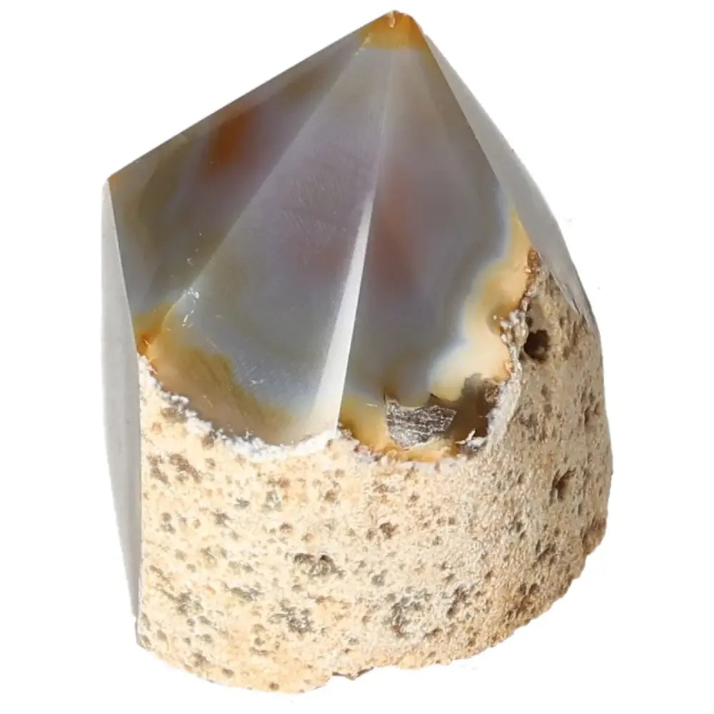Polished Agate Point crystal with vibrant hues, handcrafted by Sylvia Crystals, perfect for enhancing harmony and balance in any space.