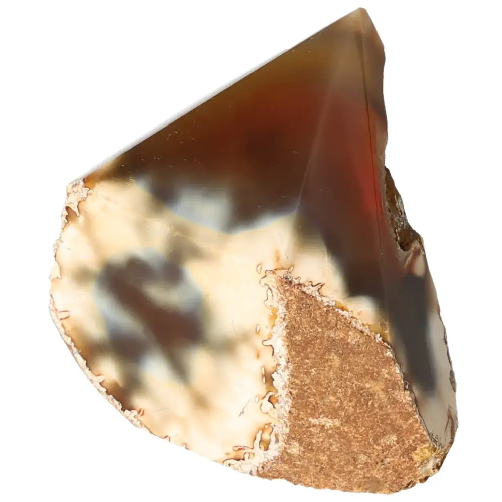 Close-up of a polished agate point gemstone from Sylvia Crystals, showcasing its smooth surface and unique patterns, ideal for energy balance.