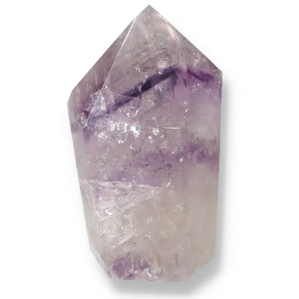 Purple polished amethyst obelisk from Sylvia Crystals, showcasing natural elegance and spiritual resonance.