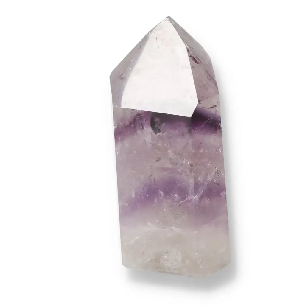 Polished Amethyst Obelisk showcasing calming energy, premium Sylvia Crystals product for stress reduction and enhanced concentration.