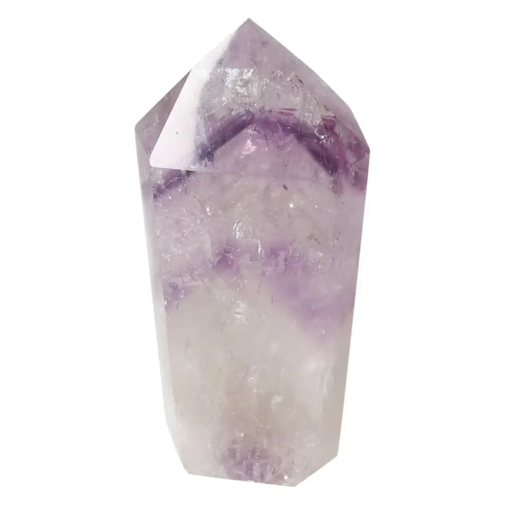 Polished Amethyst Obelisk by Sylvia Crystals, a luxury decor piece known for reducing stress and enhancing emotional stability.
