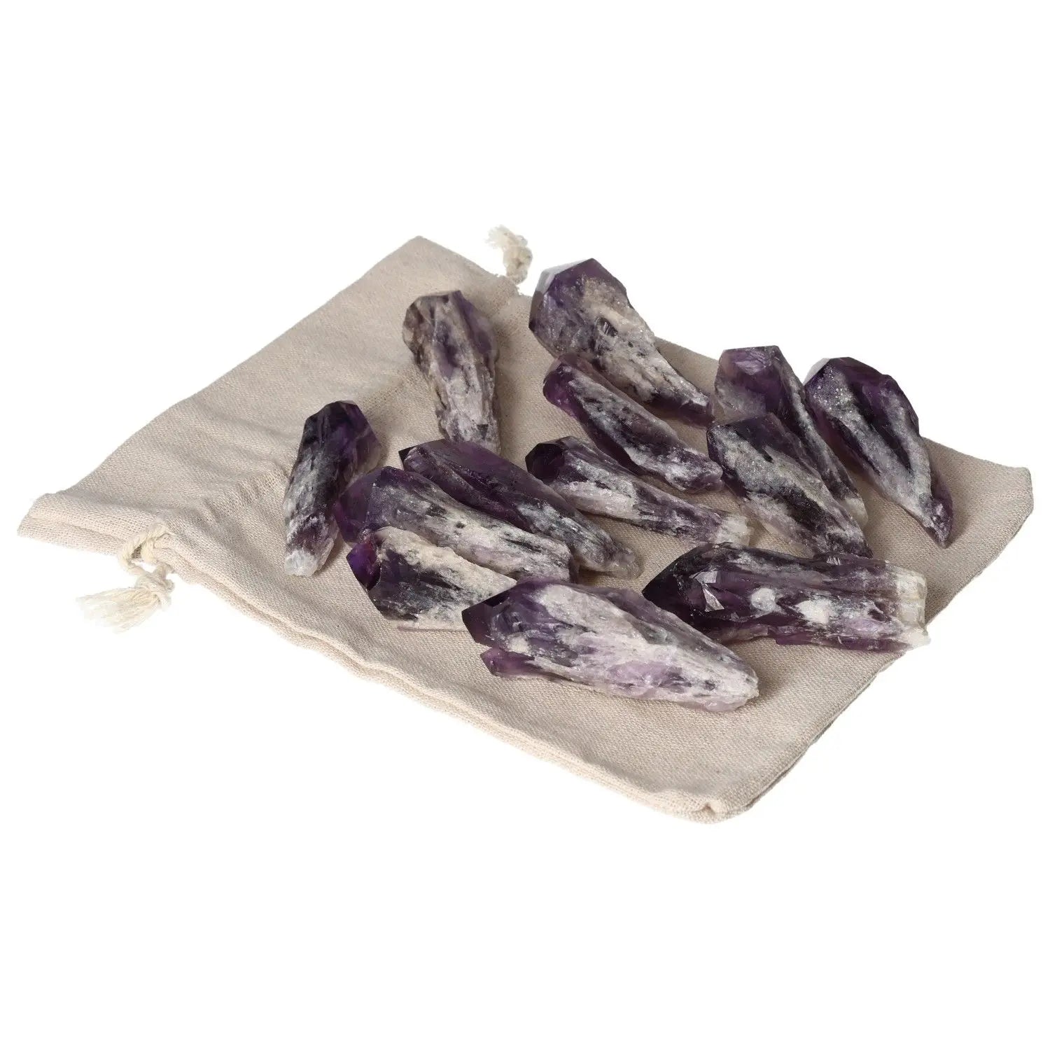Collection of Amethyst Tips on a beige cloth, showcasing their deep purple hue and natural formations.