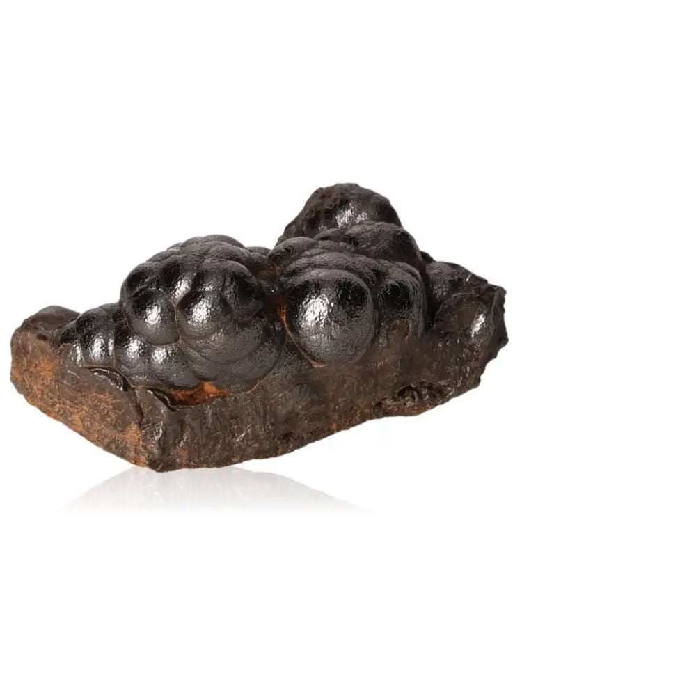 Polished botryoidal hematite crystal with metallic sheen, known for energy fortification and emotional balance.