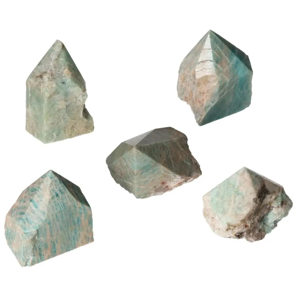 Polished Point Amazonite crystals showcasing calming teal hues, symbolizing tranquility and luxury by Sylvia Crystals.