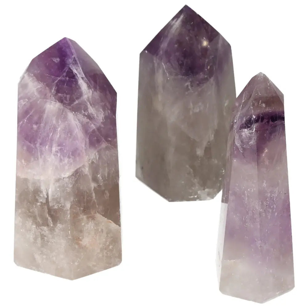 Polished Point Amethyst L from Sylvia Crystals, showcasing serene energy and exceptional craftsmanship.