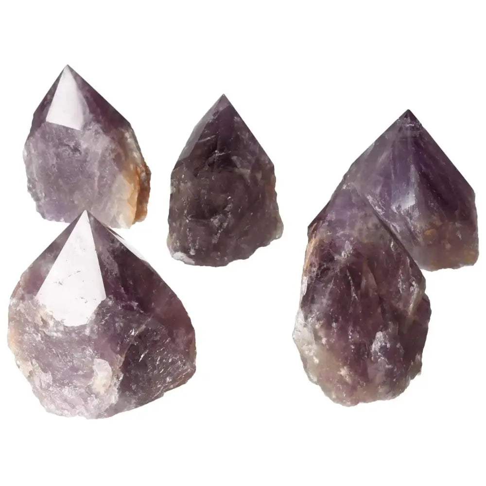 Polished Point Amethyst L stones from Sylvia Crystals, known for stress reduction and energy enhancement.