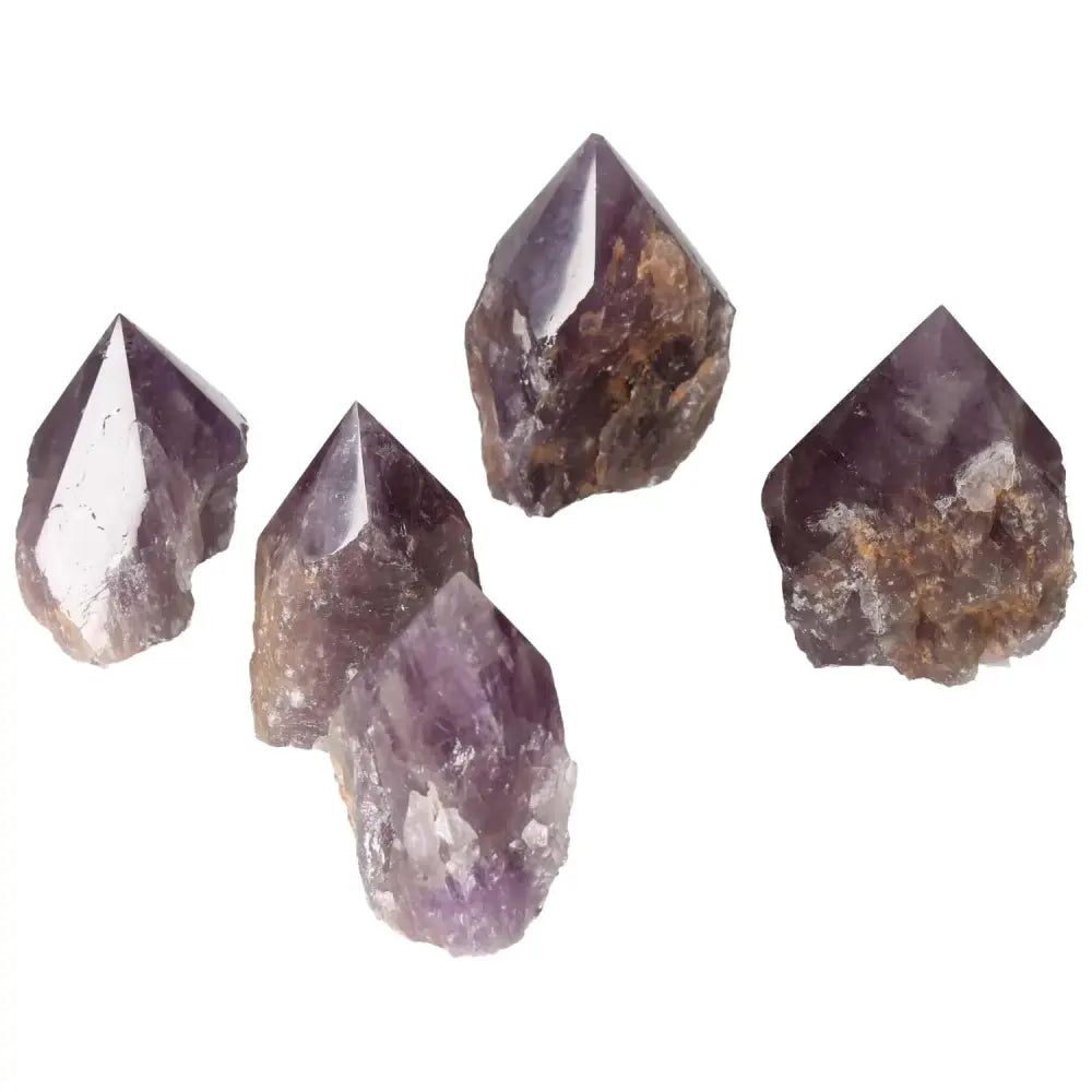 Polished Point Amethyst L stones from Sylvia Crystals, known for stress reduction, energy enhancement, and emotional stability.