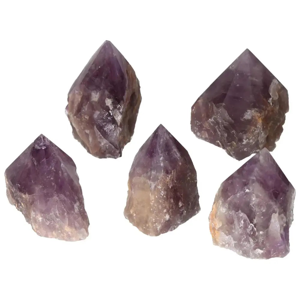 Polished Point Amethyst L crystals promoting stress relief and energy enhancement, available at Sylvia Crystals.