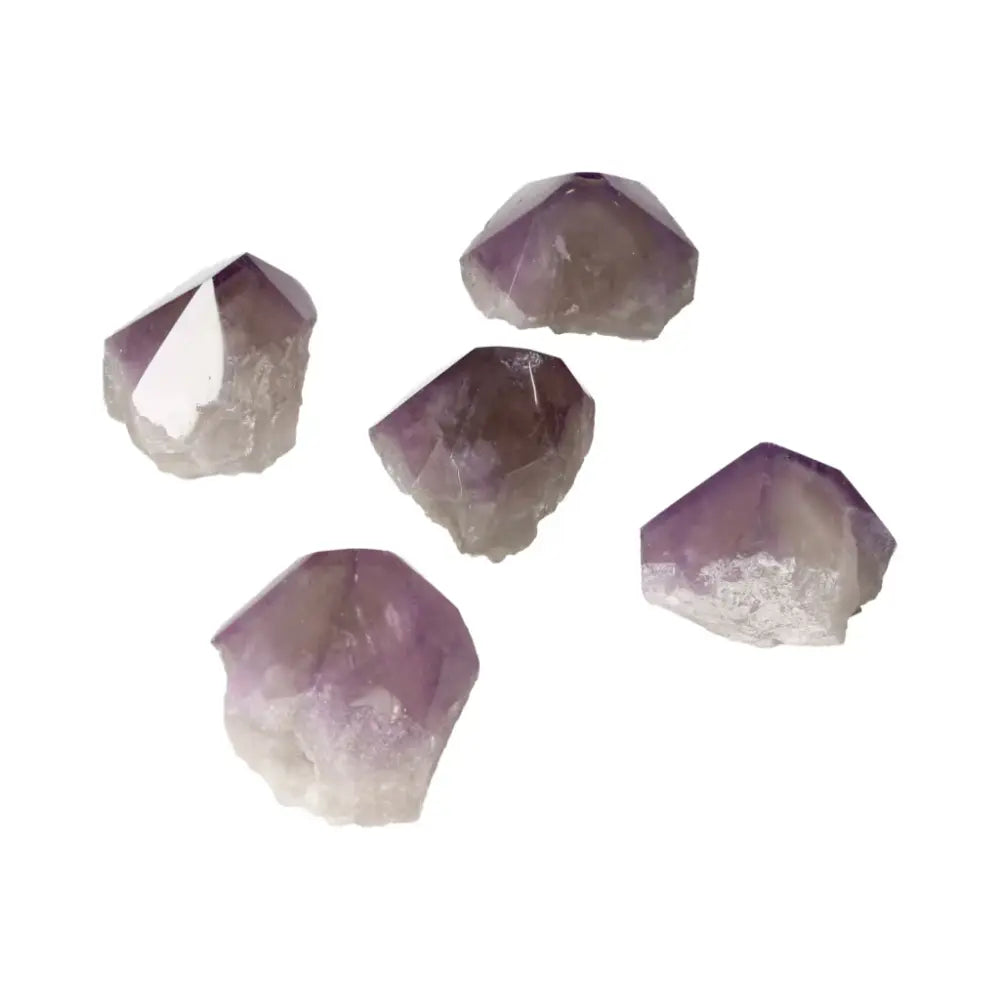 Polished Point Amethyst stones from Sylvia Crystals showcasing spiritual elegance with soothing purple hues.