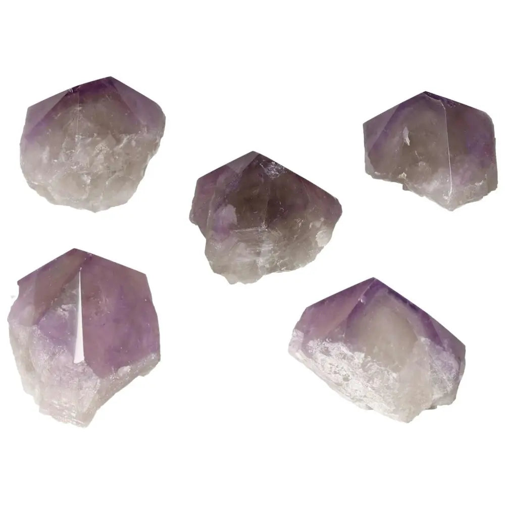 Polished Point Amethyst M crystals featuring elegant hues for spiritual elegance and mindfulness by Sylvia Crystals.