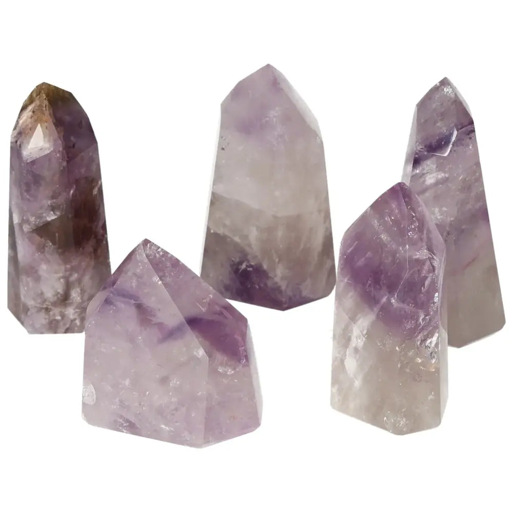 Polished Point Amethyst M crystals from Sylvia Crystals, showcasing premium quality and promoting tranquility and mental clarity.