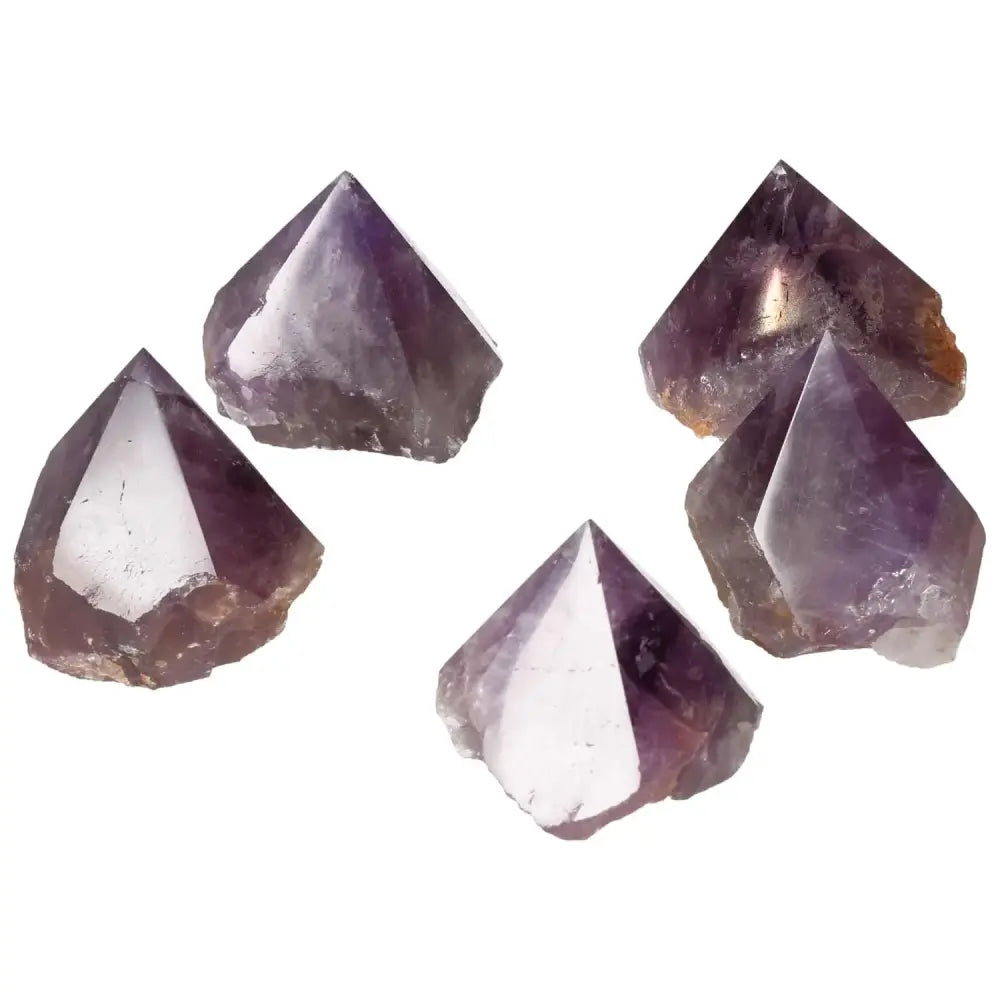 Polished Point Amethyst M stones enhancing well-being and energy, premium Sylvia Crystals collection, perfect for decor and healing.