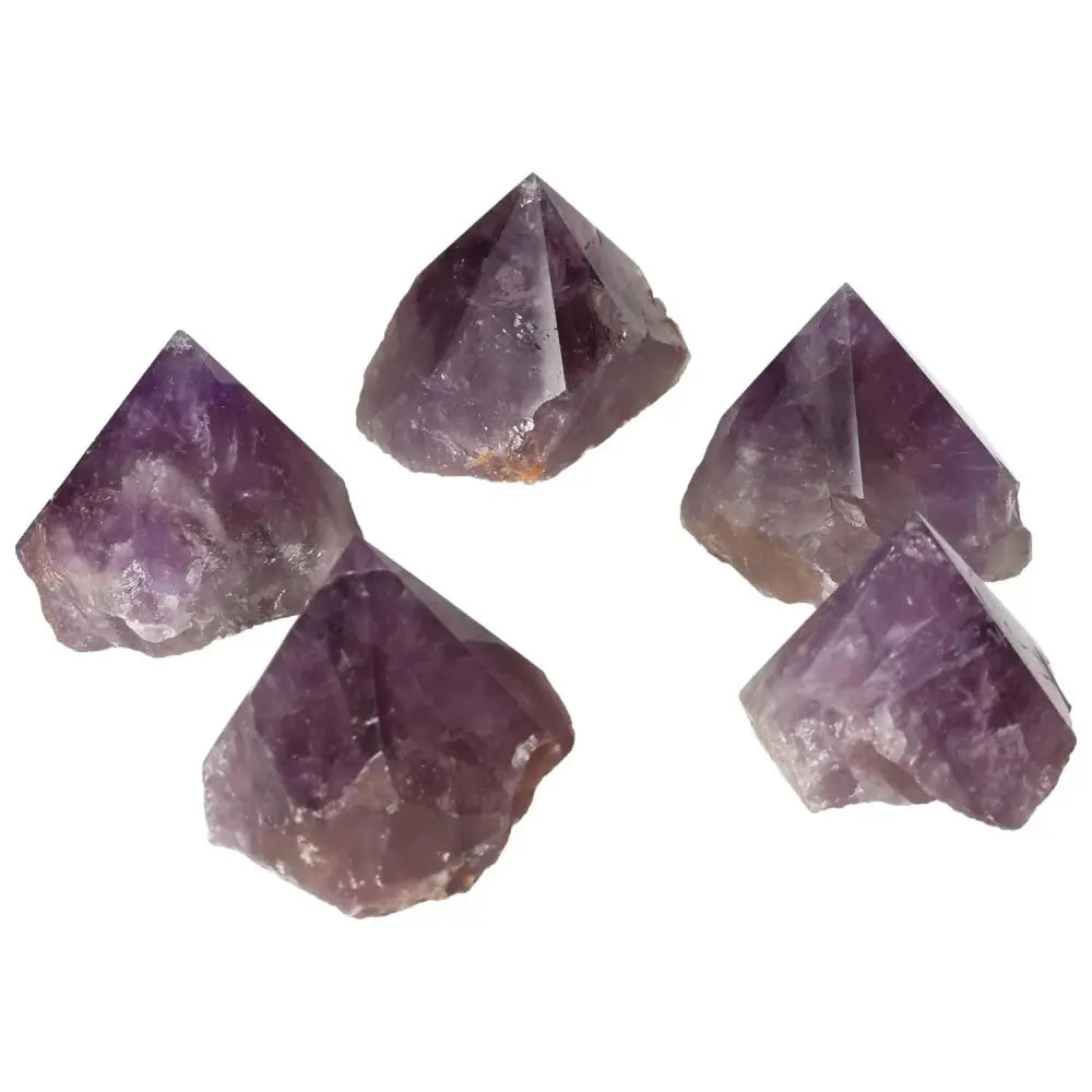 Polished Point Amethyst M stones, a luxurious Sylvia Crystals creation, perfect for enhancing well-being and living space energy.