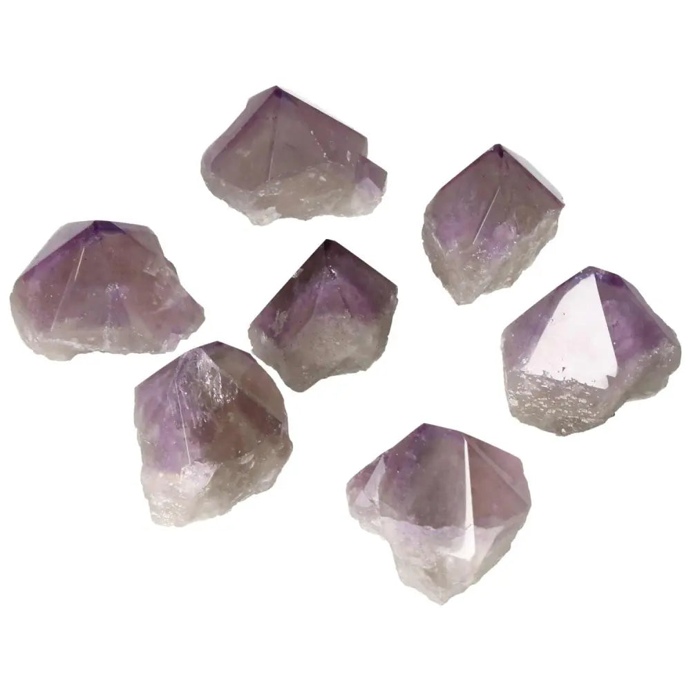 Polished Amethyst Points from Sylvia Crystals, perfect for calming and enhancing concentration.